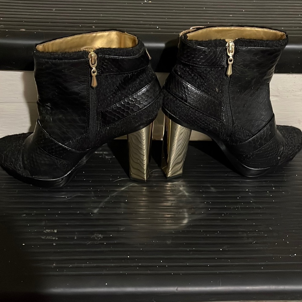 Metal embellished mid booties. Extremely comfortable vegan leather.